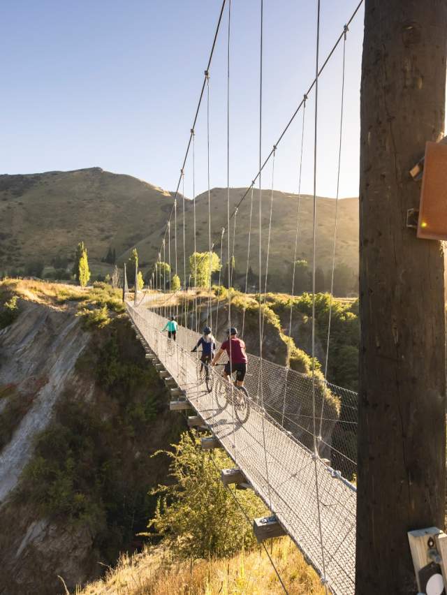 Biking over the Edgar Bridge, Arrow River Bridges Trail