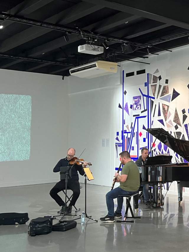 Musicians playing at Lyric and Lines Exhibition Te Atamira