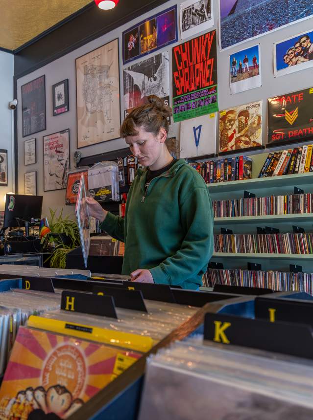 Woman Shopping at Gryphon's Wing Records in Salina, Kansas