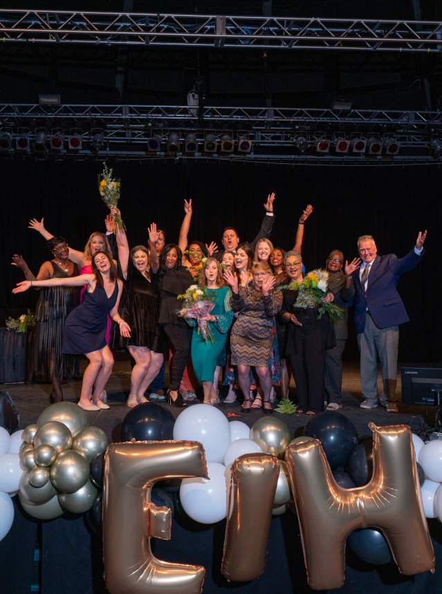 Excellence in Hospitality 2024 Staff Photo on Stage