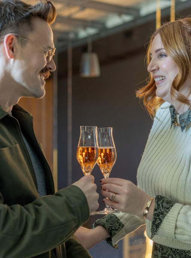 Couple toasting wine