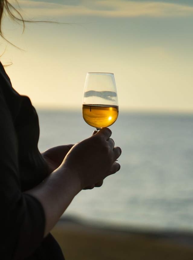 Wine glass by the waterfront