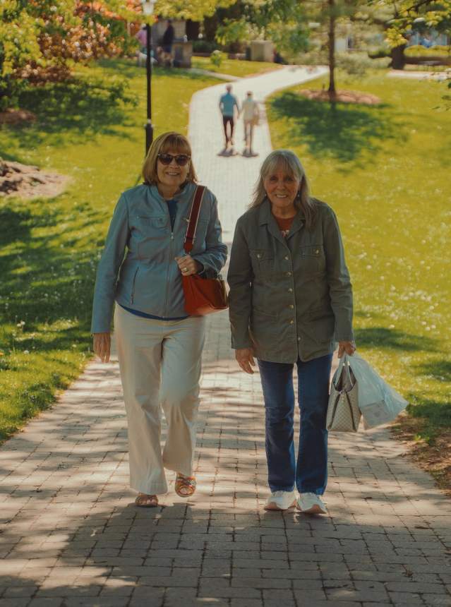 Old women walking on a park