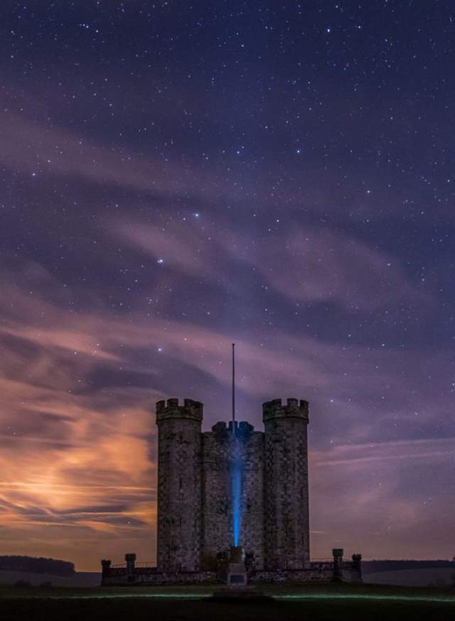 Castle silhoutted against twilight sky in Sussex