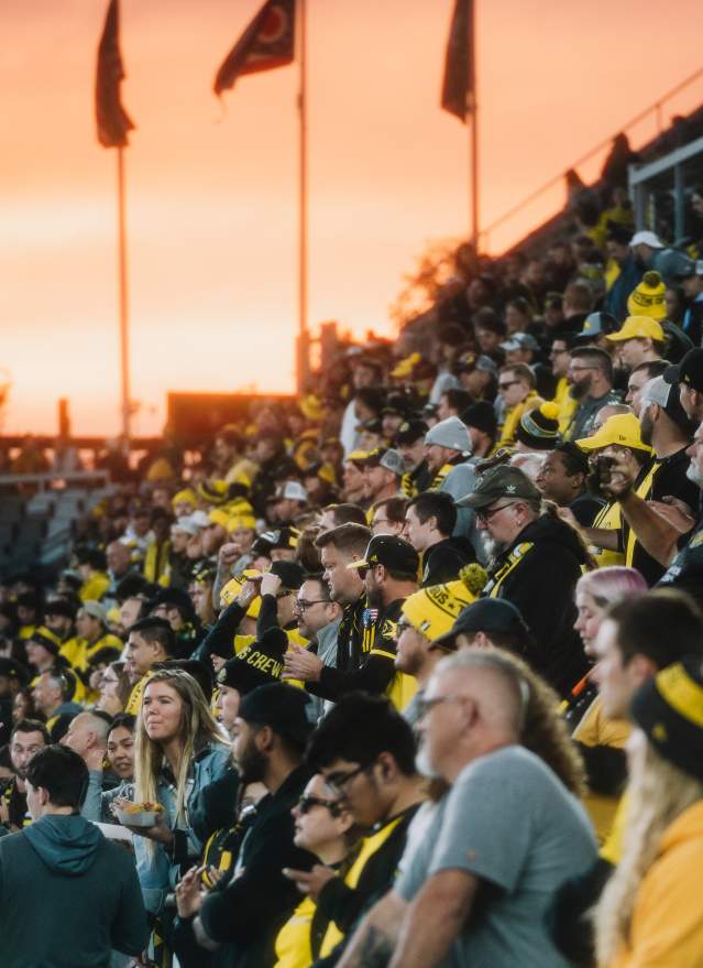 Fans watching Columbus Crew game at Lower.com field