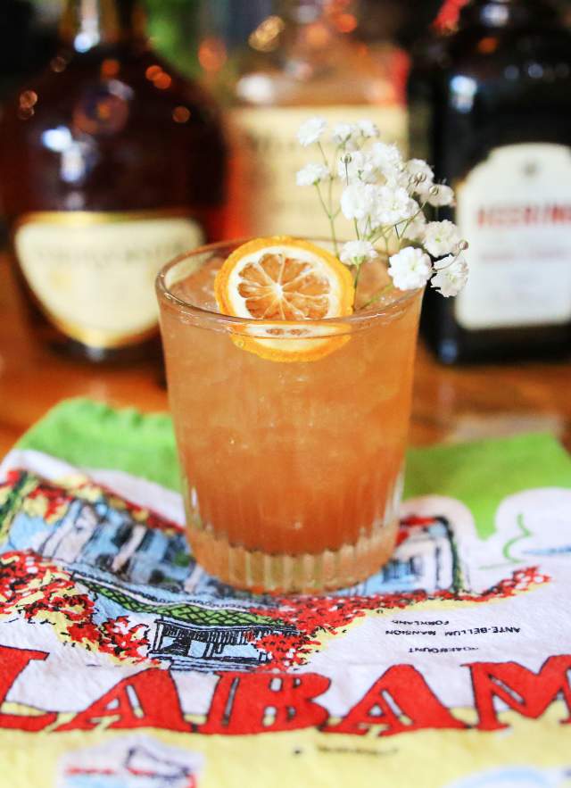 cocktail with orange garnish