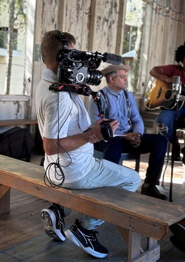 A film crew records musicians playing at the historic Dew Drop Jazz and Social Hall in Mandeville.