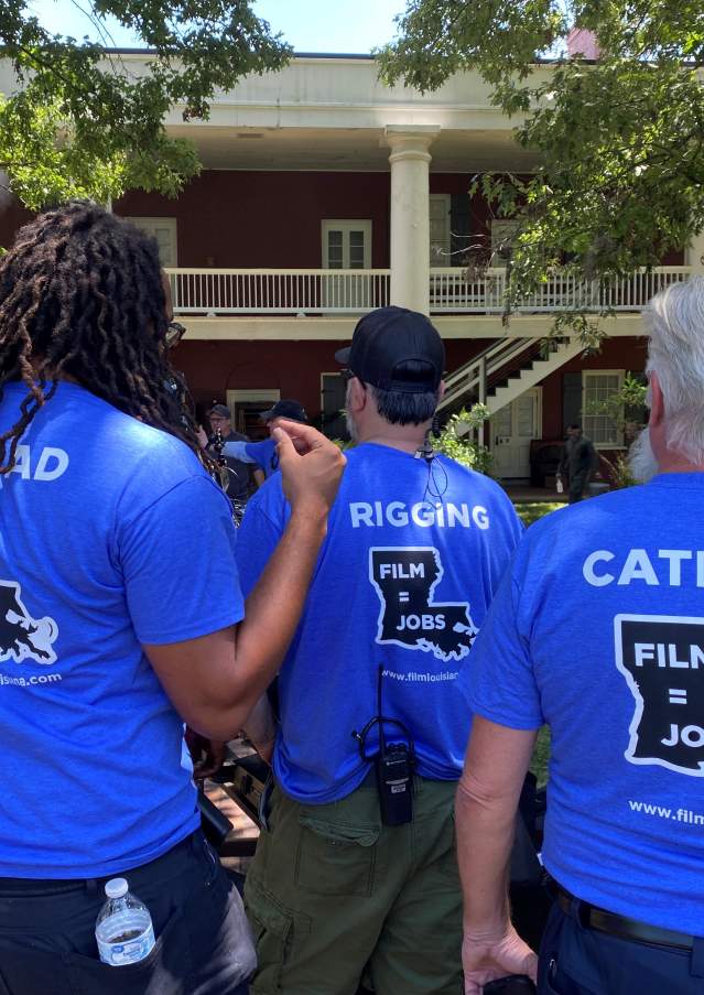 Film industry professionals record a scene at the Barracks on Film Day at the Capital, 2023