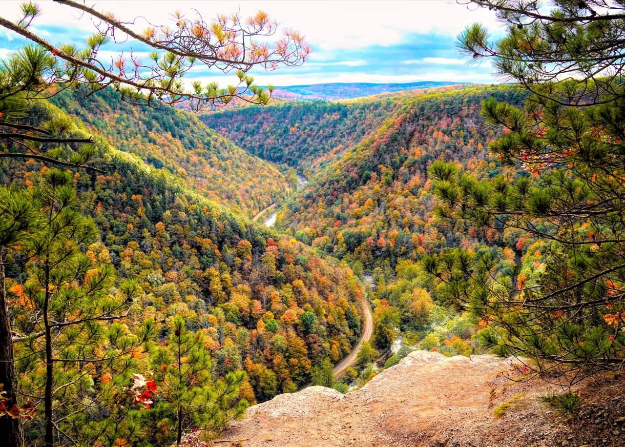 Landscape view looking out over a river gorge with fall foliage