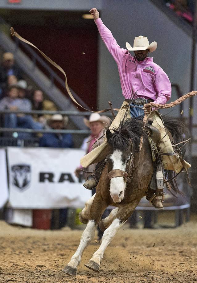 Cowboy riding Bronc at WRCA World Championship Ranch Rodeo