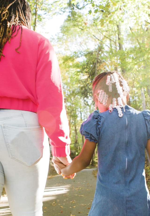 family walking on the Clarksville Greenway