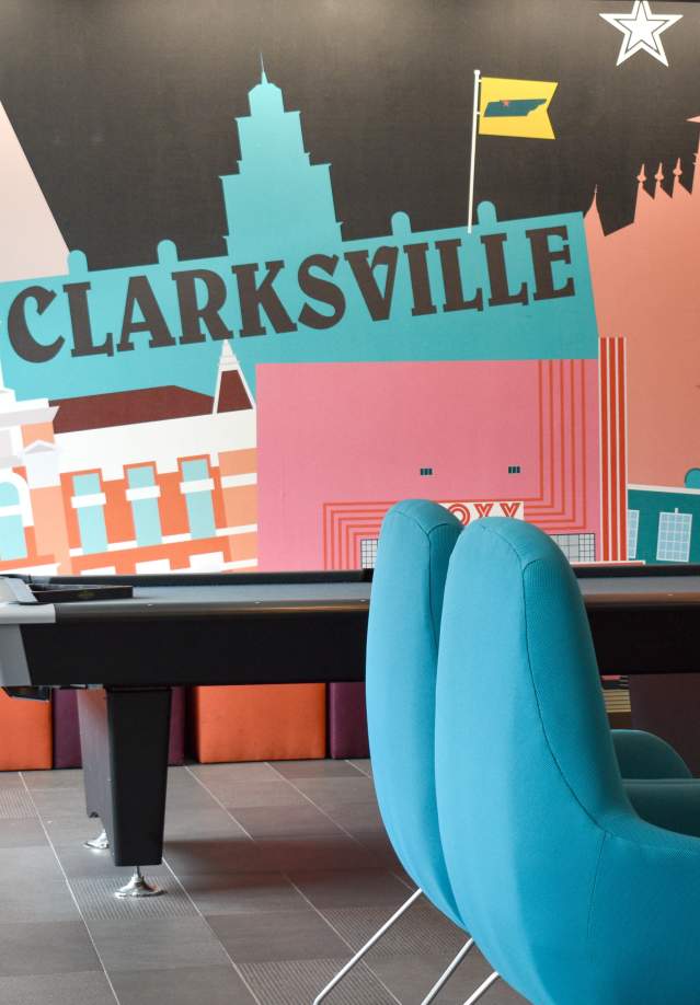 city skyline mural inside a hotel lobby