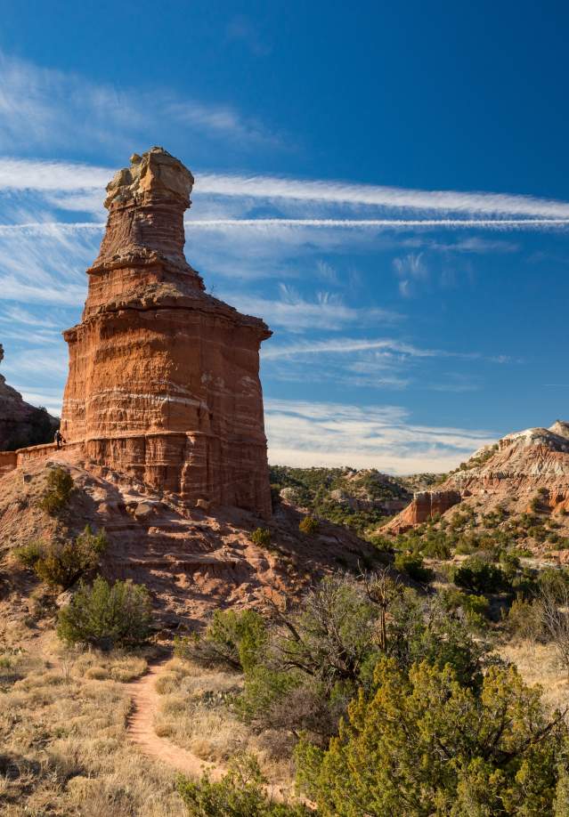 photo looking up at the lighthouse rock formation in palo duro canyon in the afternoon