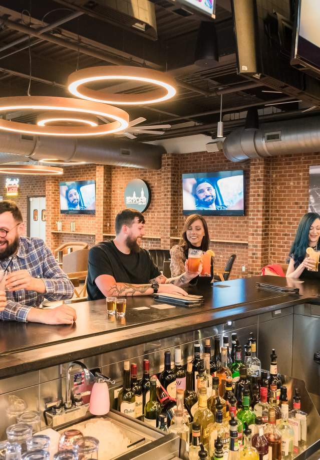 three couples at a bar