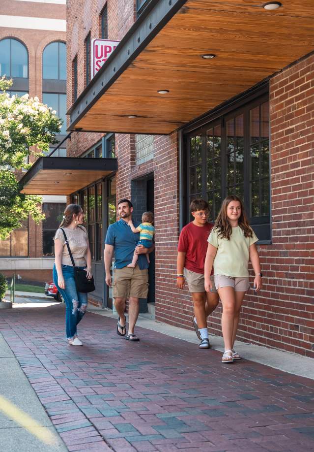 Family at Strawberry Alley Restaurant in downtown Clarksville