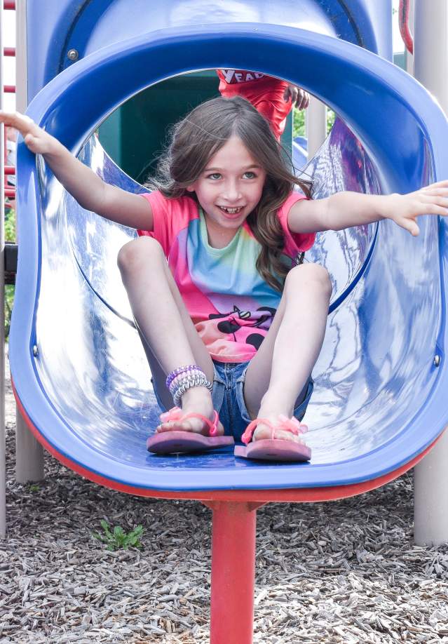girl playing on a playground