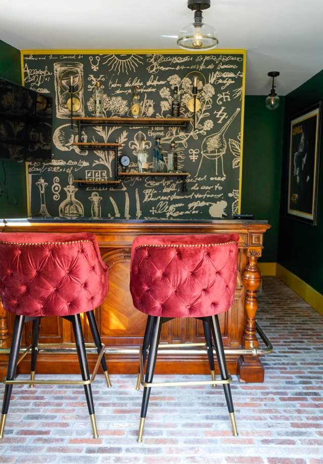 red velvet chairs at a bar