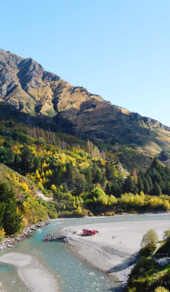 Shotover River winding through mountains in autumn