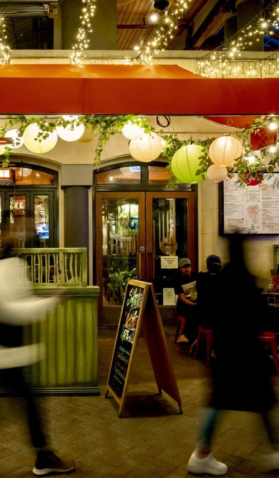 Outside view of Saigon Kingdom, with fairy lights and colourful lanterns