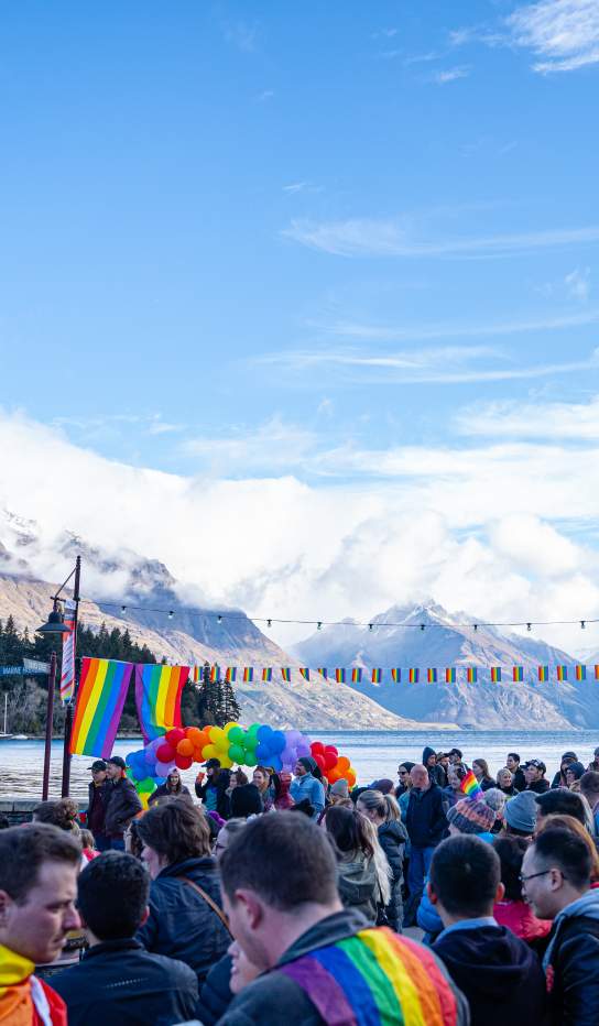 People celebrating Pride on Queenstown waterfront
