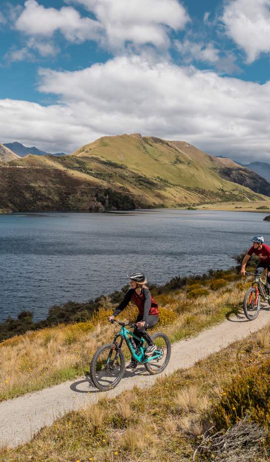 Friends mountain biking around Moke Lake
