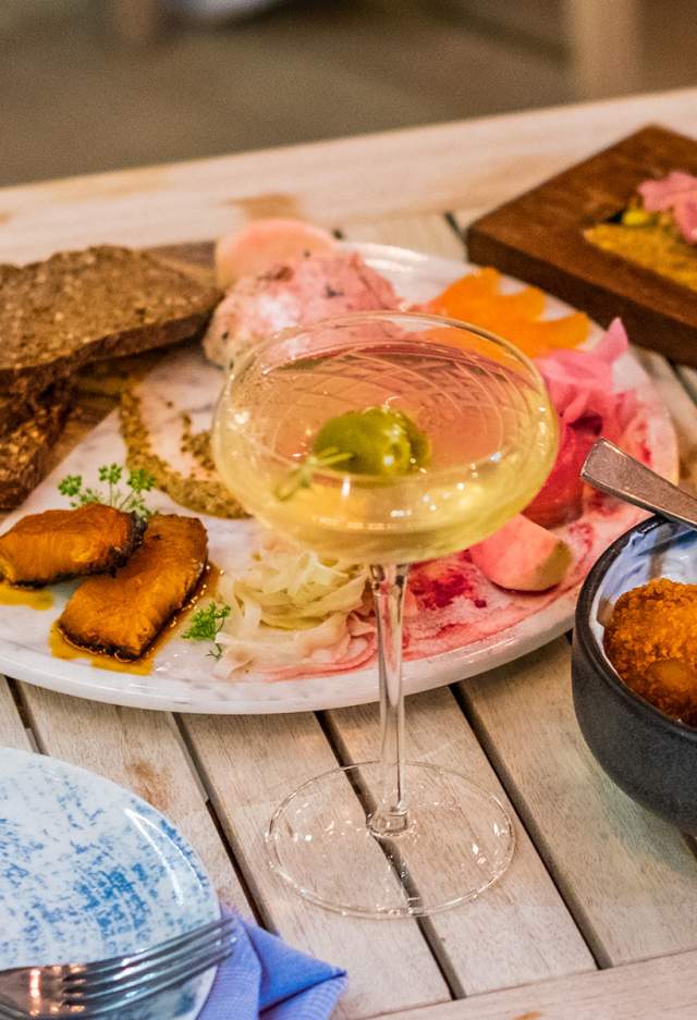 table with a variety of food an drink