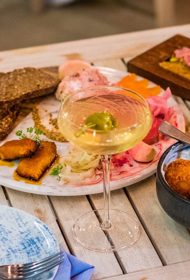table with a variety of food an drink