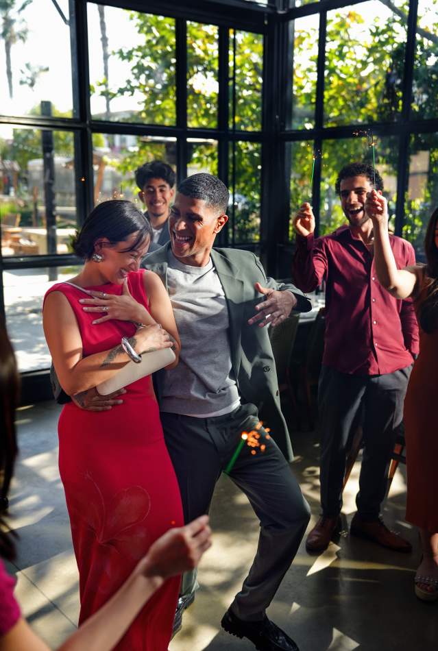 Couples and friends dancing at a vibrant social event in Anaheim, CA.