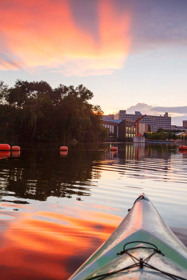 Kayak on the St. Joseph River during the summer at sunset.