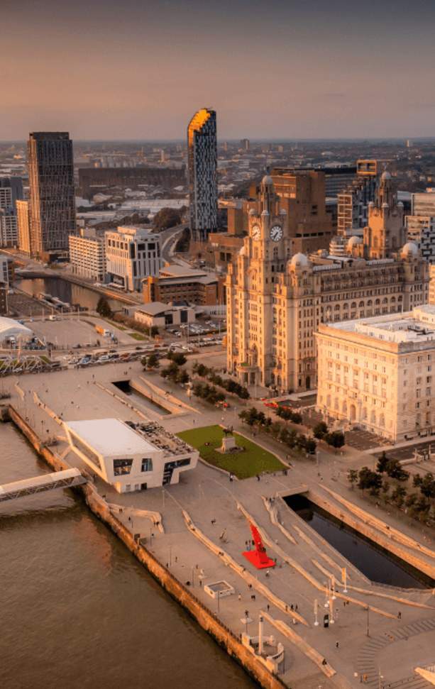 Liverpool's Pier Head waterfront taken at dusk, on a drone.
