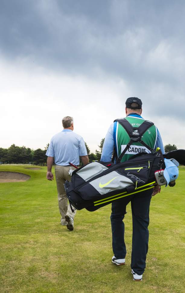 Golfer and Caddy