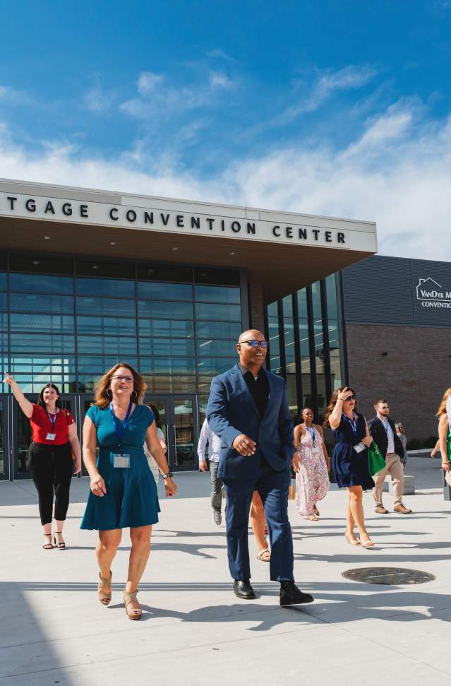 people exiting the conference center