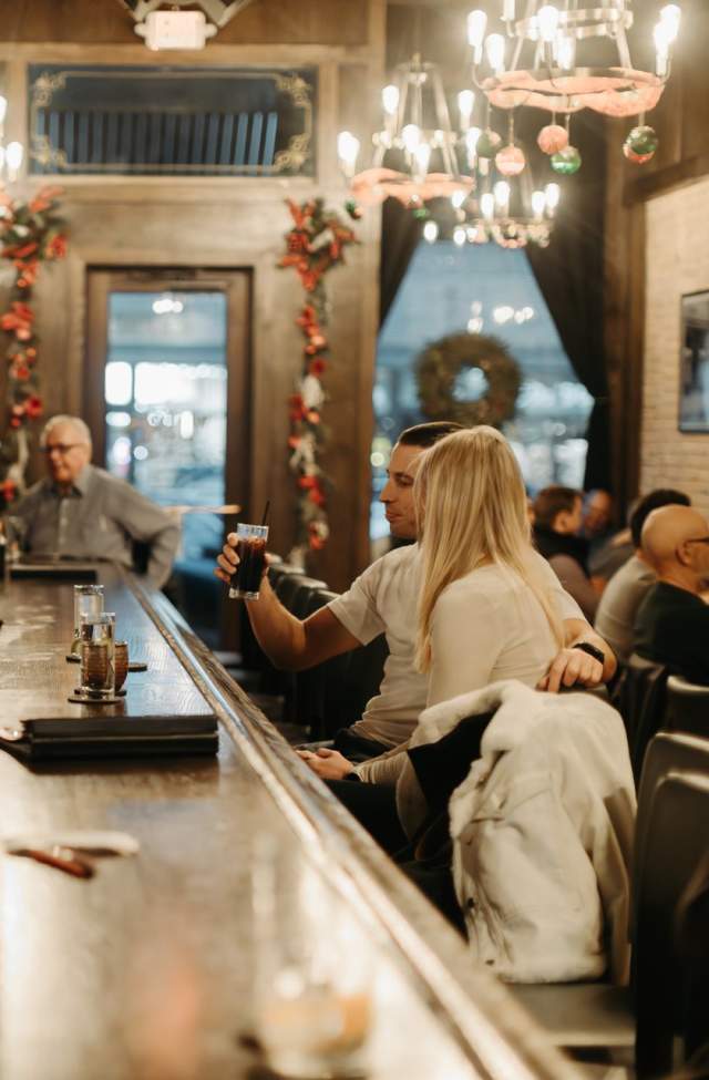couple enjoying drinks at the bar of windsor block in downtown rapid city, sd