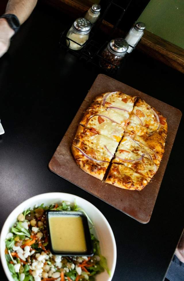 food spread from downtown rapid city, sd restaurant independent ale house on table