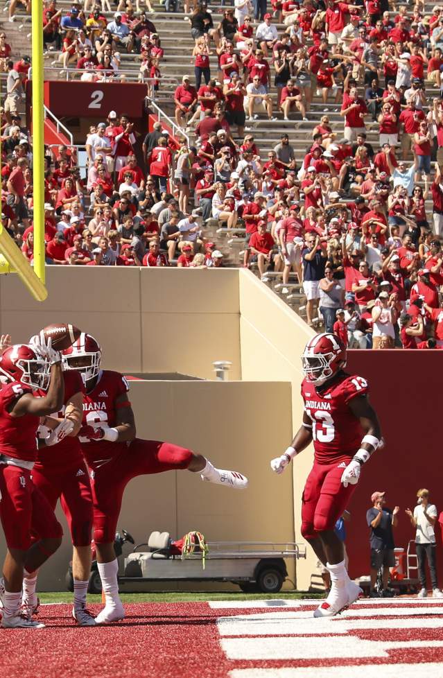 Hoosiers celebrating a touchdown on the field