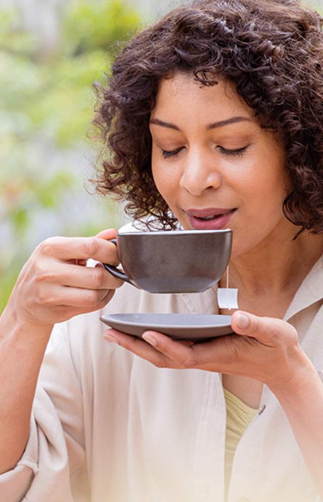 Sonoma Winter Wellness - a woman enjoying a cup of tea in Sonoma