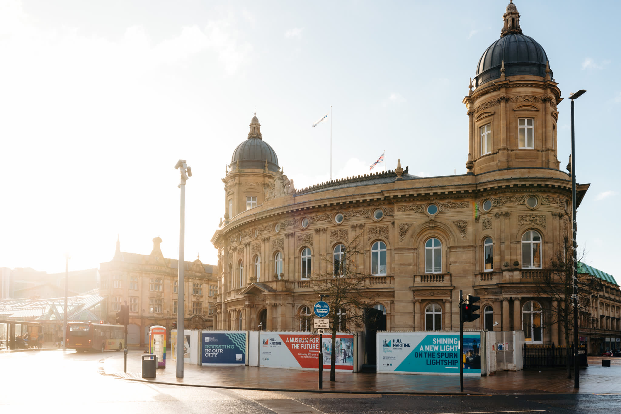 Hull Maritime Museum exterior with ornate historic architecture and colourful flower displays on a sunny day