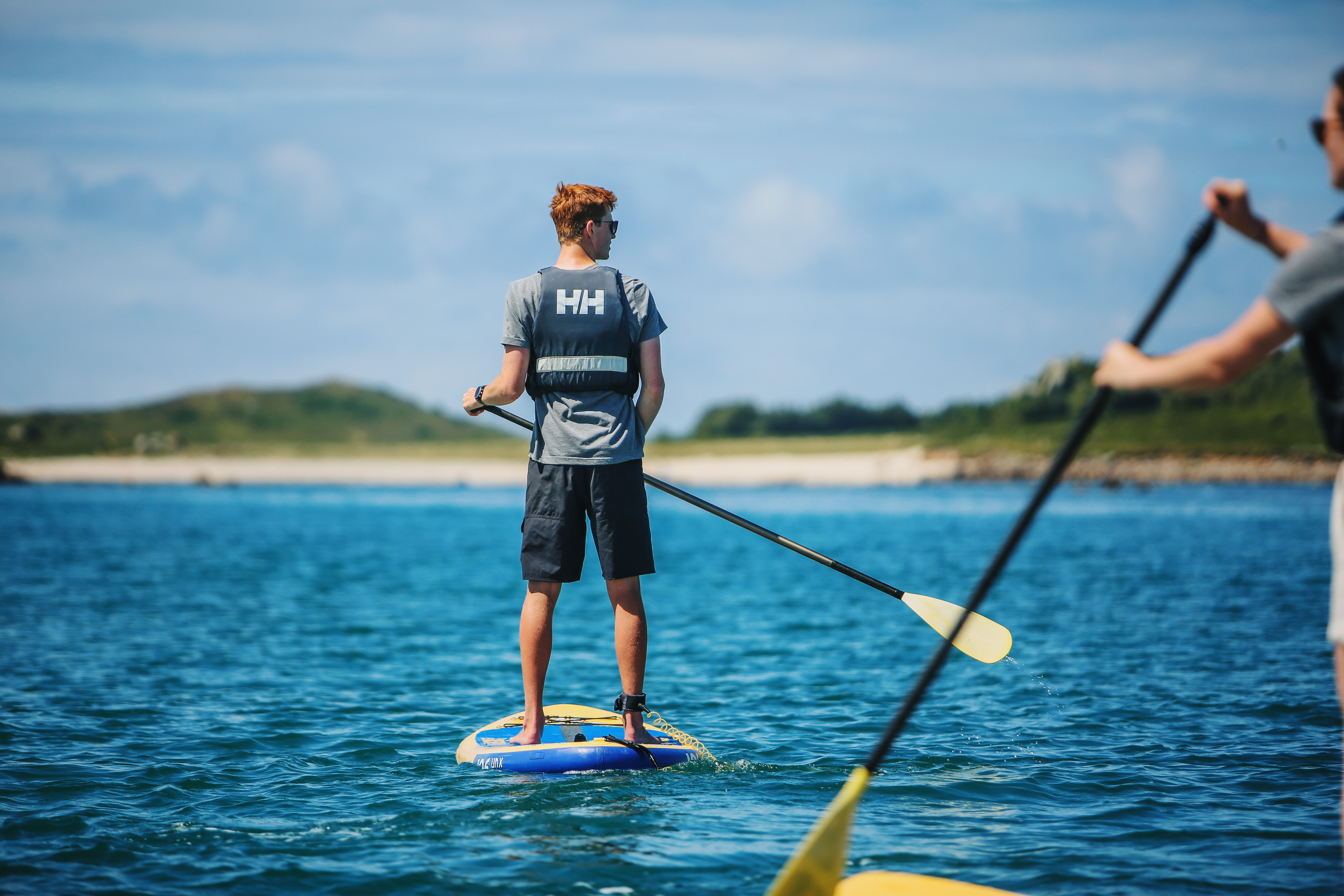 Paddleboarding teenagers