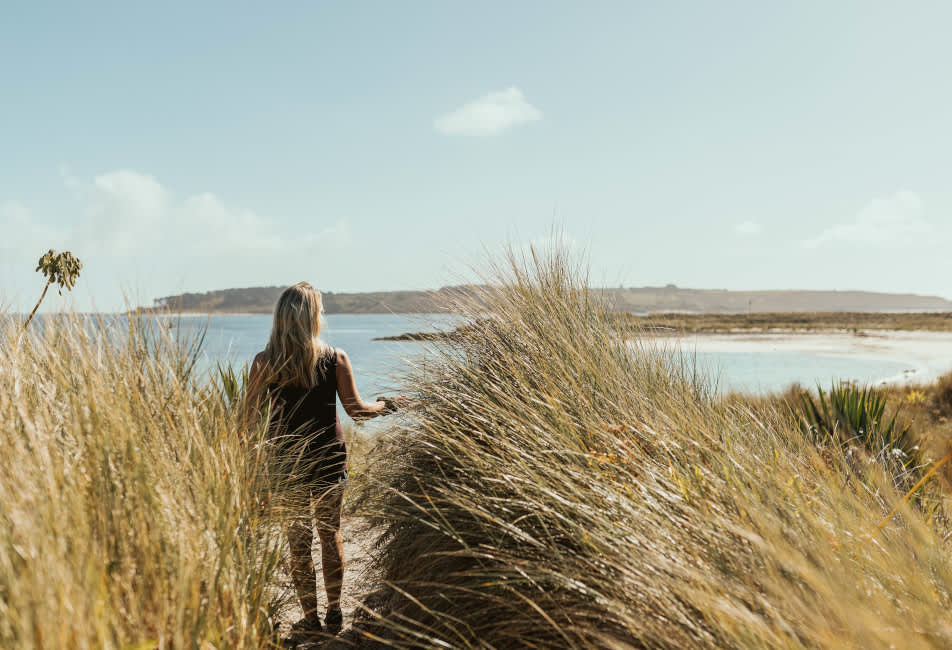 Girl on beach in autumn