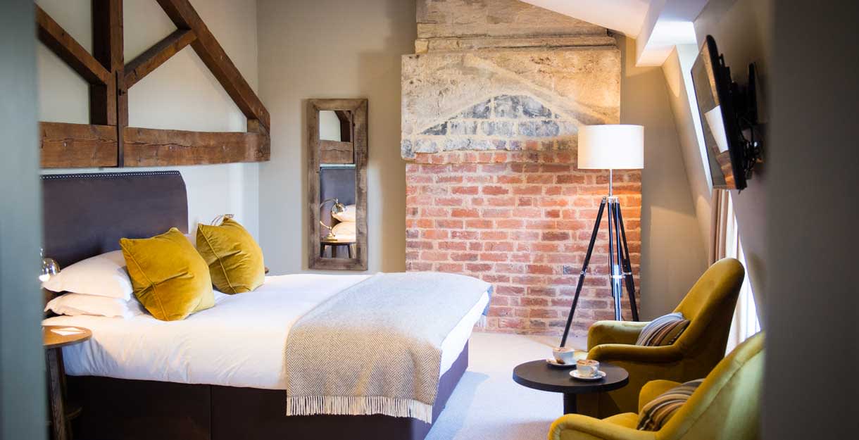 Feature bedroom in the Kings Head in Cirencester