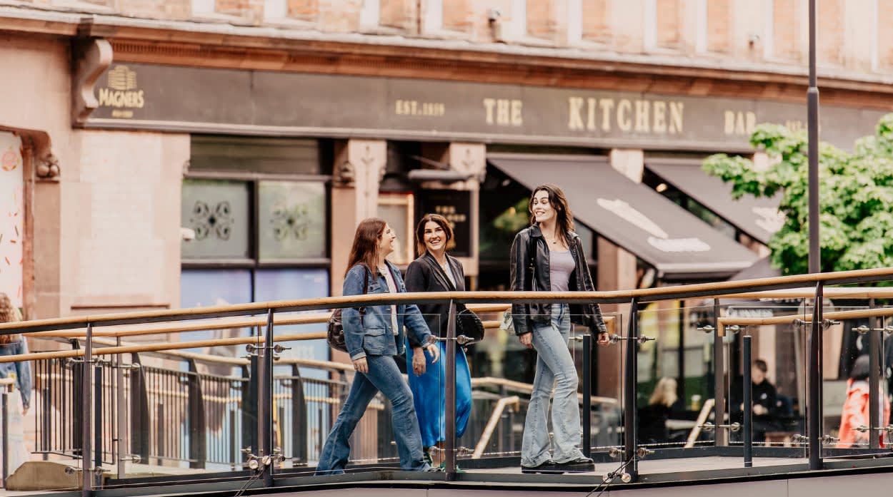Group of girls walking through Victoria Square