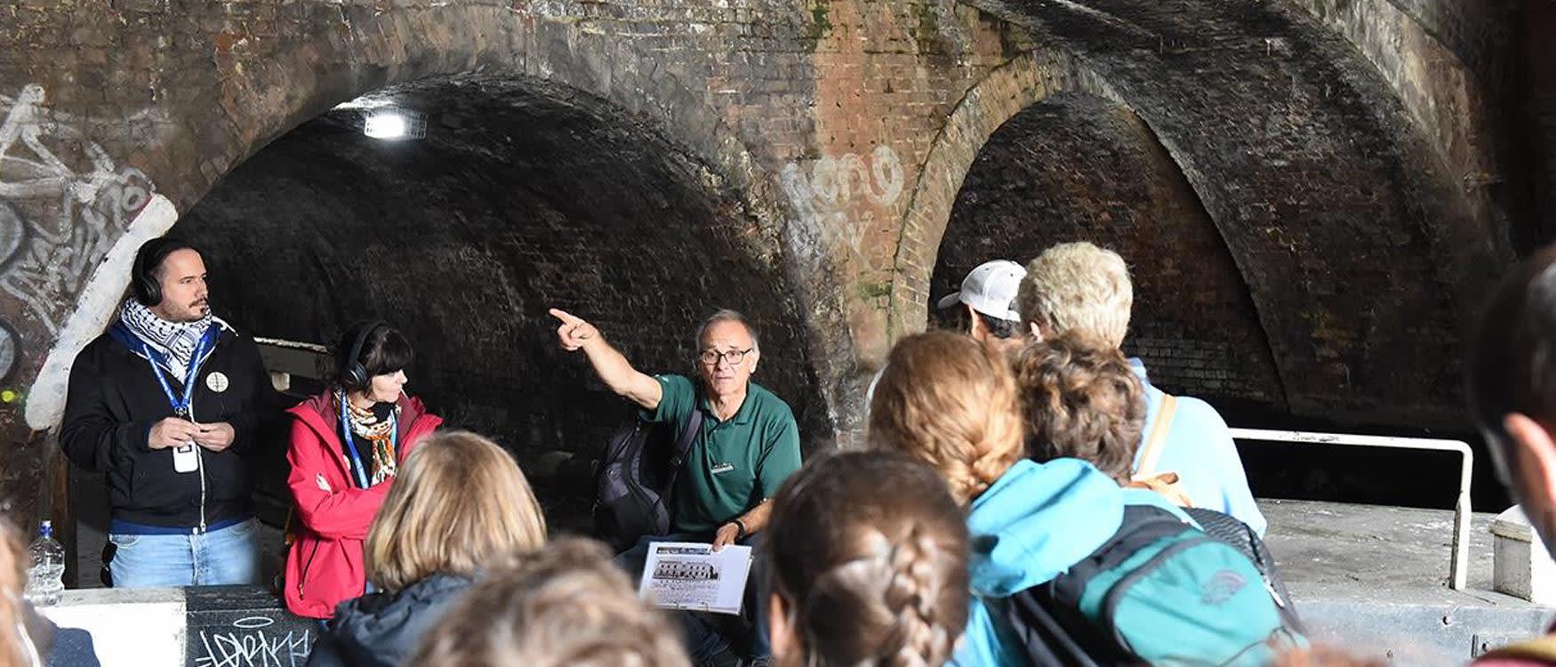 Group doing a walking tour of canals