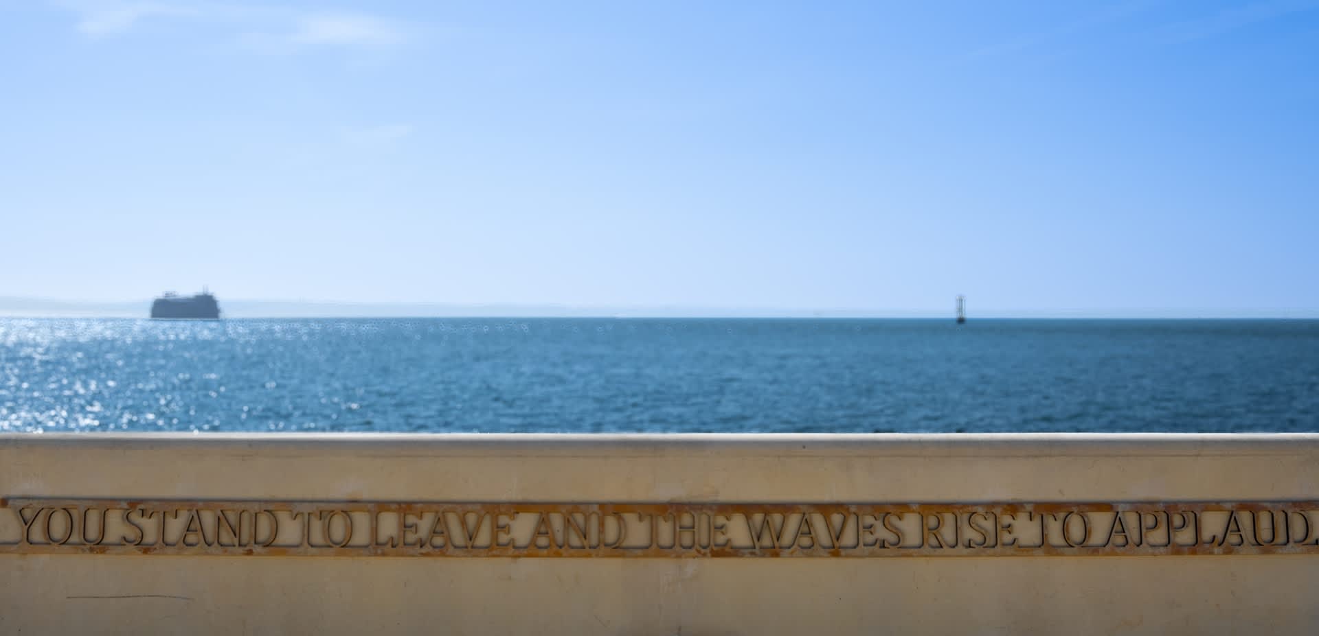 Photograph showing a line of the Poet Laureate poem 'Theatre of the Sea' installed on Southsea Promenade