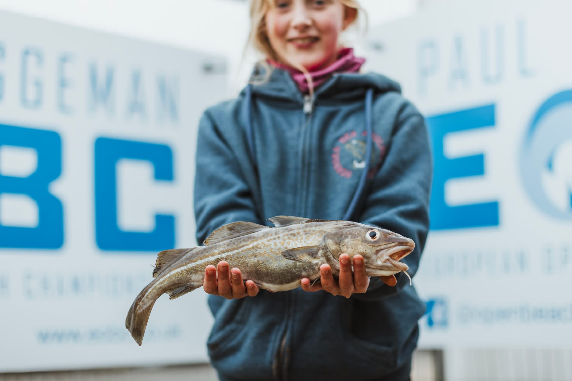 Girl holding fish