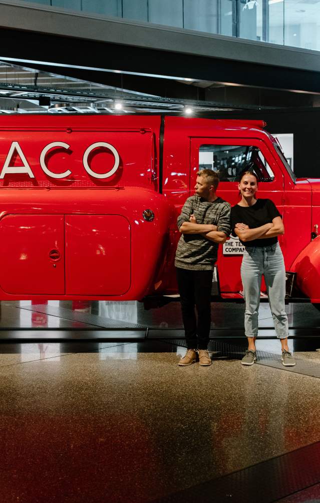 Couple in front of Texaco Truck