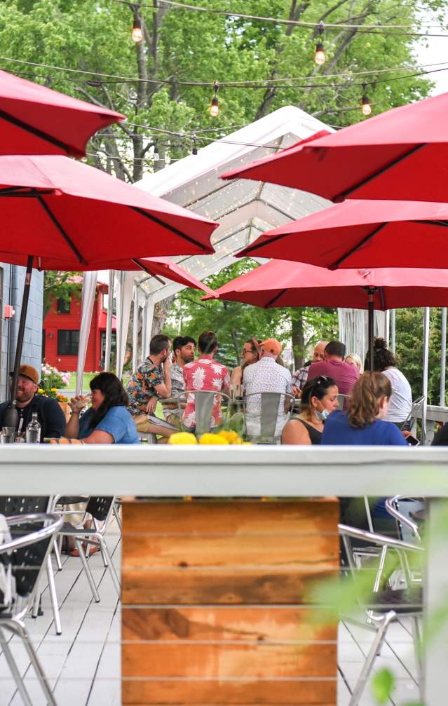 People dining on Cardinal Spirits' patio