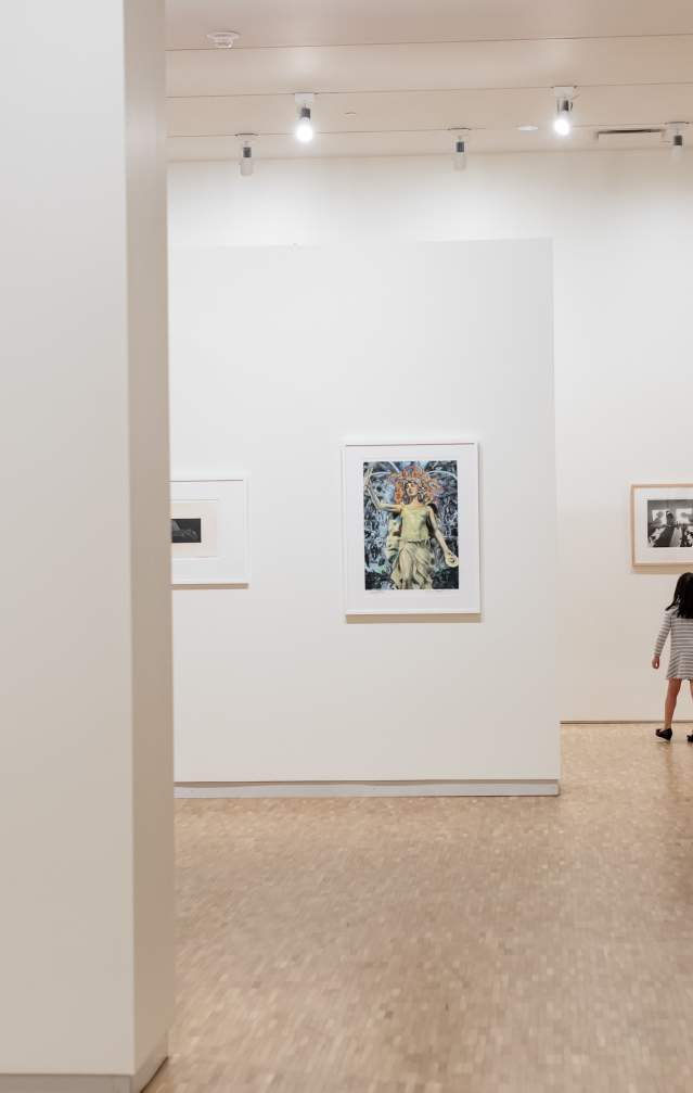 A mother and daughter observing art at the Eskenazi Museum of Art