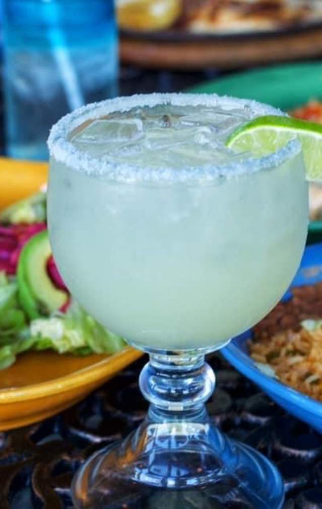 Several dishes and a margarita from Viva Mas