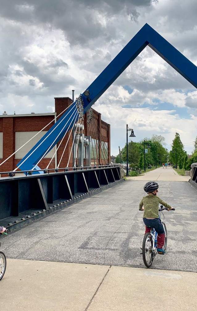 Two kids riding bikes on the B-Line Trail