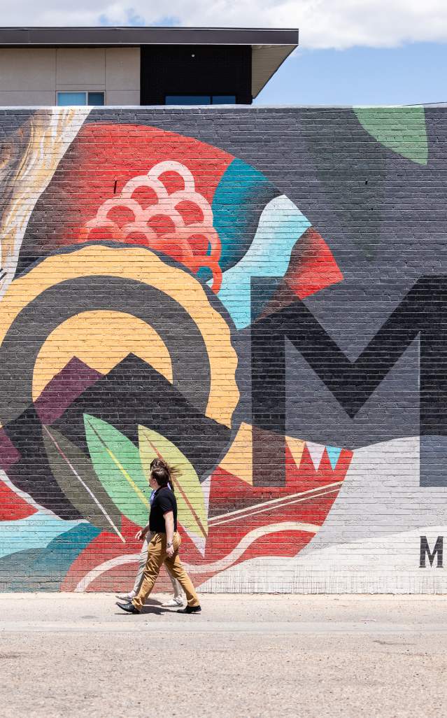 Mural on the side of the building of the apartments at Maddie